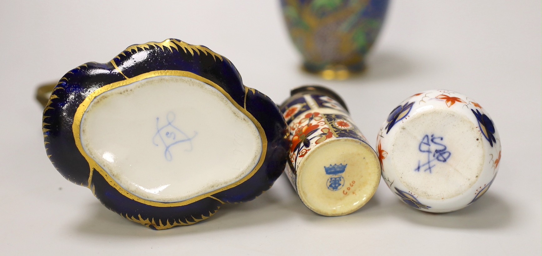 A pair of Vienna style porcelain pink ground vases, late 19th century, a Sevres style trinket box, and other ceramics. Tallest 16cm